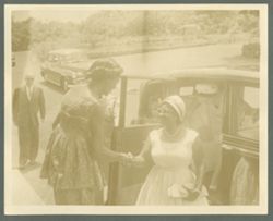 Mrs. Antoinette Tubman greeted upon arrival by woman