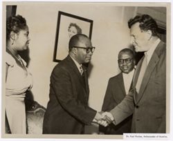 Dr. Karl Gruber, Ambassador of Austria greets Vice President Tolbert