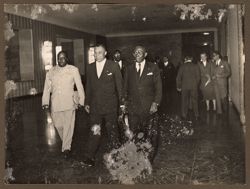 President Tubman walks with Liberian dignitaries