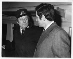 Bayh and conductor on Valparaiso-Chicago train