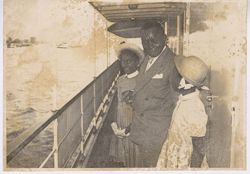 President Tubman and girls standing on deck of ship