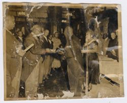 President Tubman shakes hands with a dignitary in the Executive Parlours