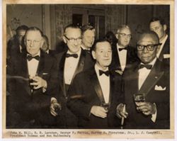 John W. Hill, B. H. Larabee, George F. Ferris, Harvey S. Firestone, Jr., L. J. Campbell, President Tubman and Ben Maidenburg