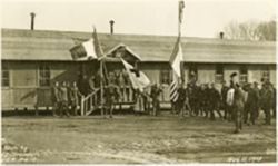 People with flags at Base Hospital 13 on the day the armistice was signed