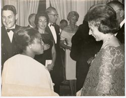 Mrs. Tubman mingles with guests at a formal event