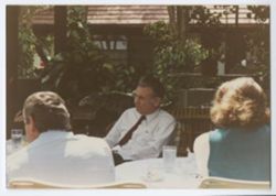 Ten-person gathering around tables, #2