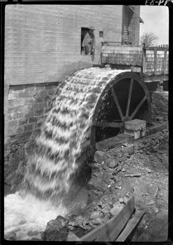 Same as no. 30, miller in window (Water wheel in action, Greensboro mill)