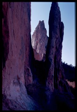 Sentinel Rock seen through crotch between 2 slabs Garden of the Gods Colorado