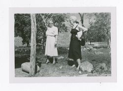 Two women standing outdoors