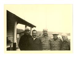 Jack and Roy Howard with others outside