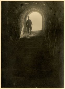 Photographer posing in entrance to a dungeon of Berg Gleichen