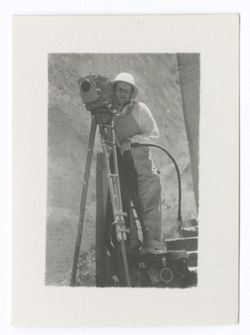 Item 1196. Eisenstein standing on a crate or trunk behind camera, all on steps which are just visible in lower right corner. See Item 490 above.