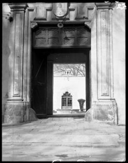 Through doorway to patio where man suffered torture