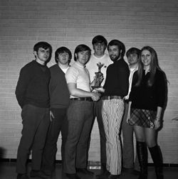 IU South Bend students with trophy, 1970s