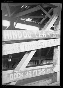 Signs on interior of old bridge