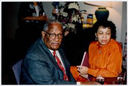 Herman Hudson with unidentified woman