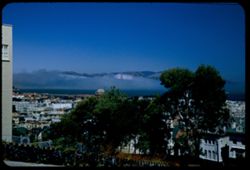 Fog comes through Golden Gate. View from Fillmore and Broadway. San Francisco.