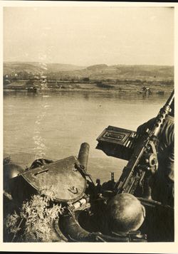 Sherman tank crew watching for submarines and mines