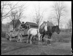 Jim Lawson and children in wagon