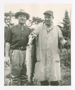 Quide(?) and Mims(?) Thomason holding fish