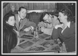 Ginger and Johnny Mercer, Hoagy Carmichael, and Ruth Carmichael at the Racquet Club in Palm Springs, 1938-1939.