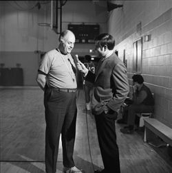 IU South Bend men's basketball coach being interviewed, 1970s