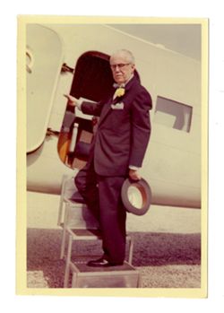 Roy Howard boarding airplane
