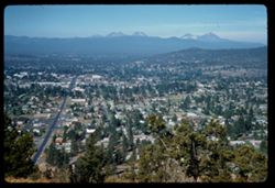 View west across Bend, Oregon toward Cascade peaks