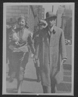 Hoagy Carmichael and Ruth Carmichael walking down New York City street.