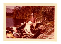 Roy Howard and others in canoe