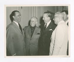 Roy Howard laughing with others