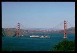 LURLINE and freighter meet under Golden Gate bridge