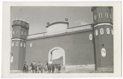 Item 27. Entrance to Hacienda. Five men on horseback - center, Eisenstein, other unidentified., to his left, Kimbrough