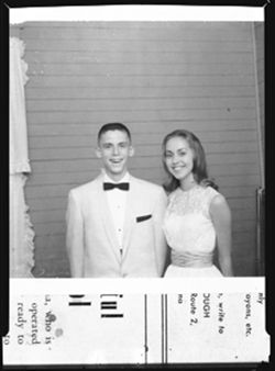 Boy and girl dressed for prom, unidentified