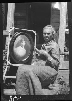 Estel Scrock, enlarged picture being held for Kodak shot