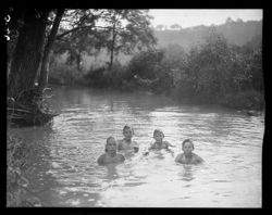 Boys swimming along road, out of Madison