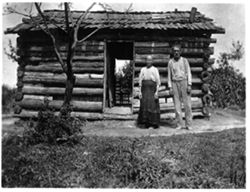 Bill Hardin and wife and their Weed Patch cabin