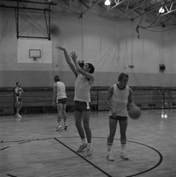 IU South Bend men's basketball player shoots a free throw in practice, 1970s