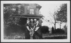 In-laws at a Carmichael party, holding Lida Carmichael, summer 1936.
