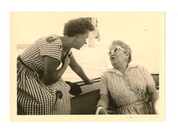 Two women talk on boat 2