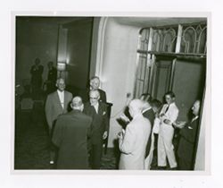 Roy Howard greeting others at event