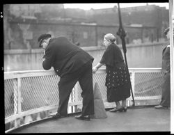 Capt. Tom and Mrs. Greene watching tieup at Vicksburg (?)