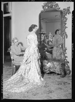 Susan Thompson Bailey (seated) and Betty Osterbur Fish at Sconce home, wedding gown (4 copies)