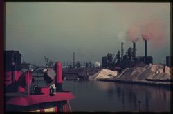 P-17= Steel Mills at mouth of Calumet river Chicago. Fire and boat at left. C.W. Cushman Nedill