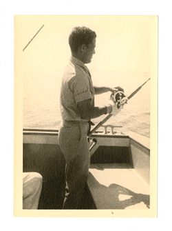 Young man with fishing rod