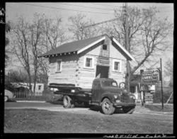 Moving Leila David cabin to Van Buren street (Jack Rogers)