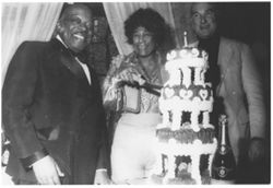 Ella Fitzgerald with Count Basie at a reception