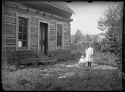 Cabin with large and small girl