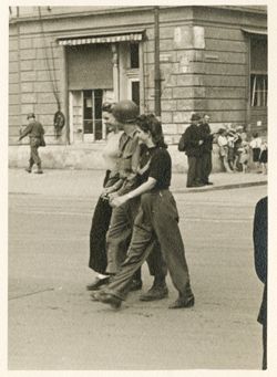Soldier and women walking, Regensberg, Germany