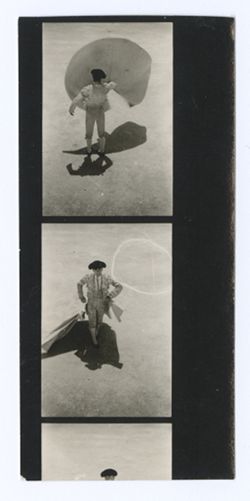 Item 0111.  All long shots taken from above, showing Liceaga in the bull ring making passes with his cape. 2 1/3 prints.